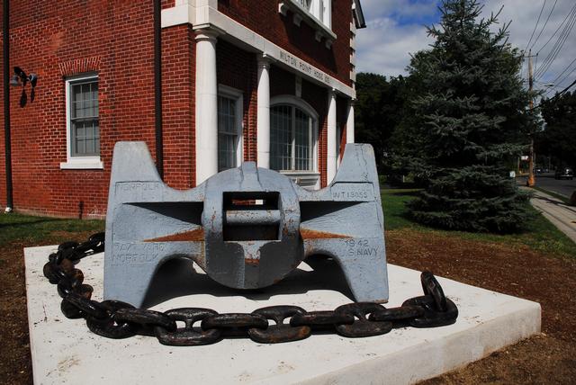 The USS Boston anchor in front of the Milton Fire House